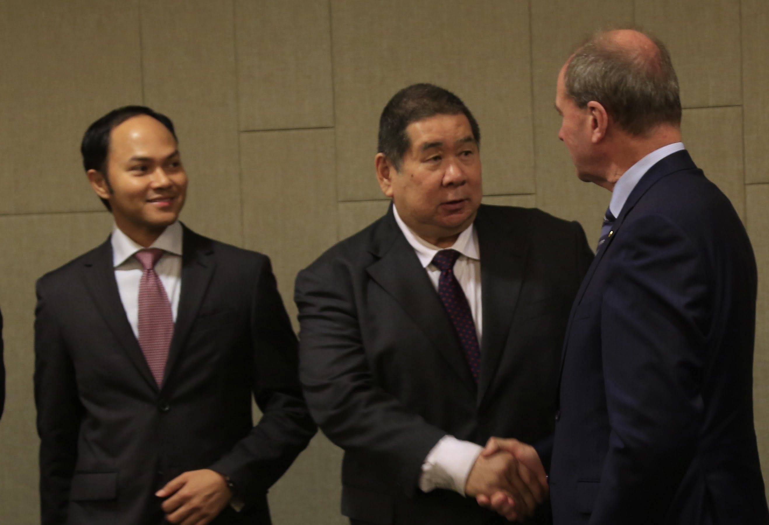 Hadri smiling with Minister